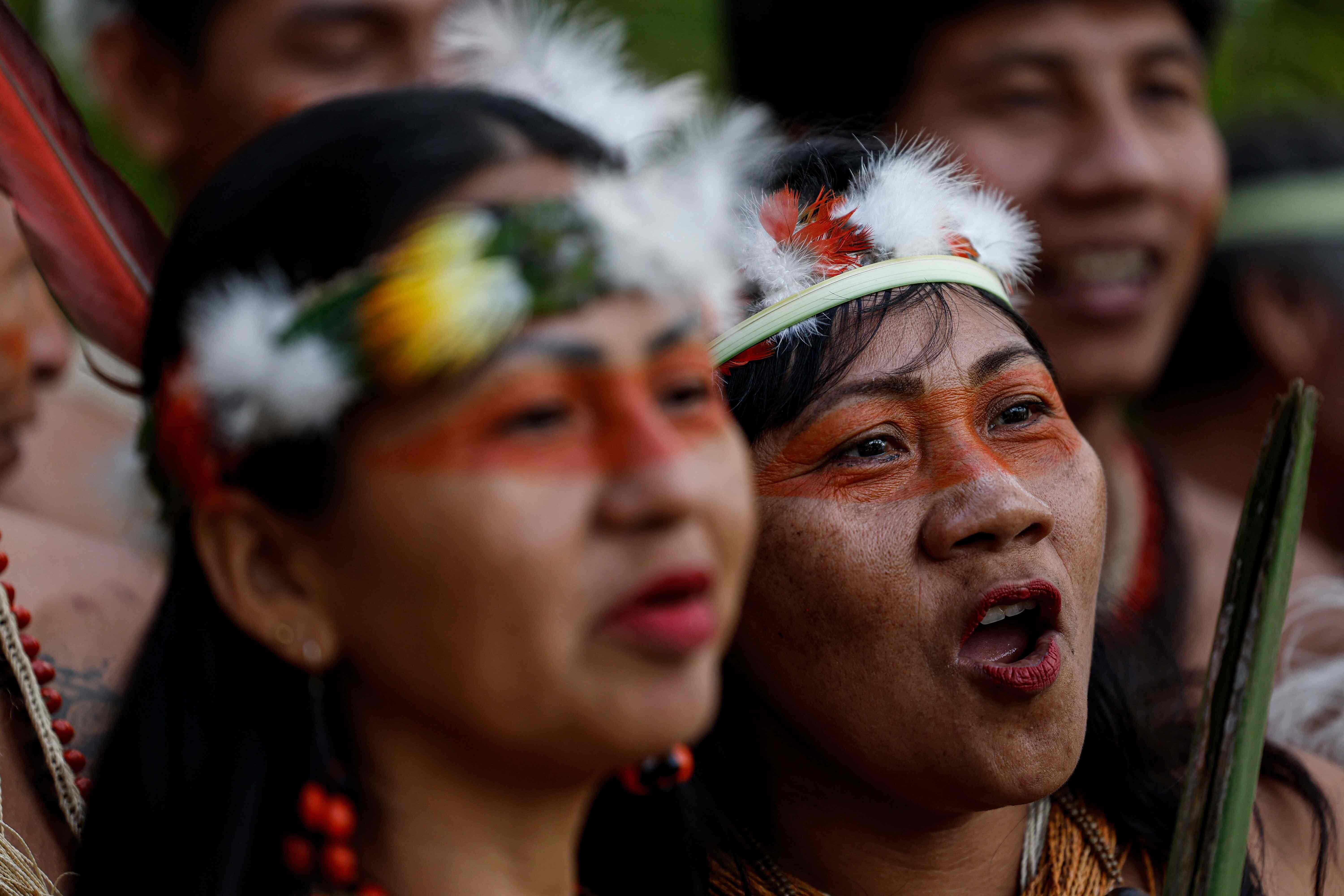 Members of the Waorani indigenous community demonstrate for peace, for nature, and to promote a Yes vote in the referendum to end oil drilling in the Yasuni National Park, in the commercial area in northern Quito, on August 14, 2023.