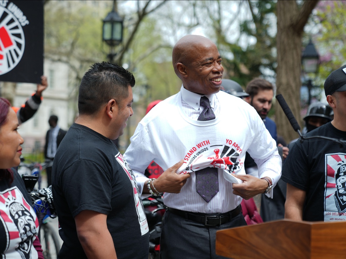NYC Mayor Eric Adams joins Los Deliveristas Unidos to celebrate new protections in the food delivery industry that took effect on April 21, 2022 in New York City.