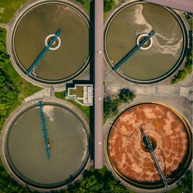 Natural gas flaring, waste water treatment plant, and cows in a feedlot. 