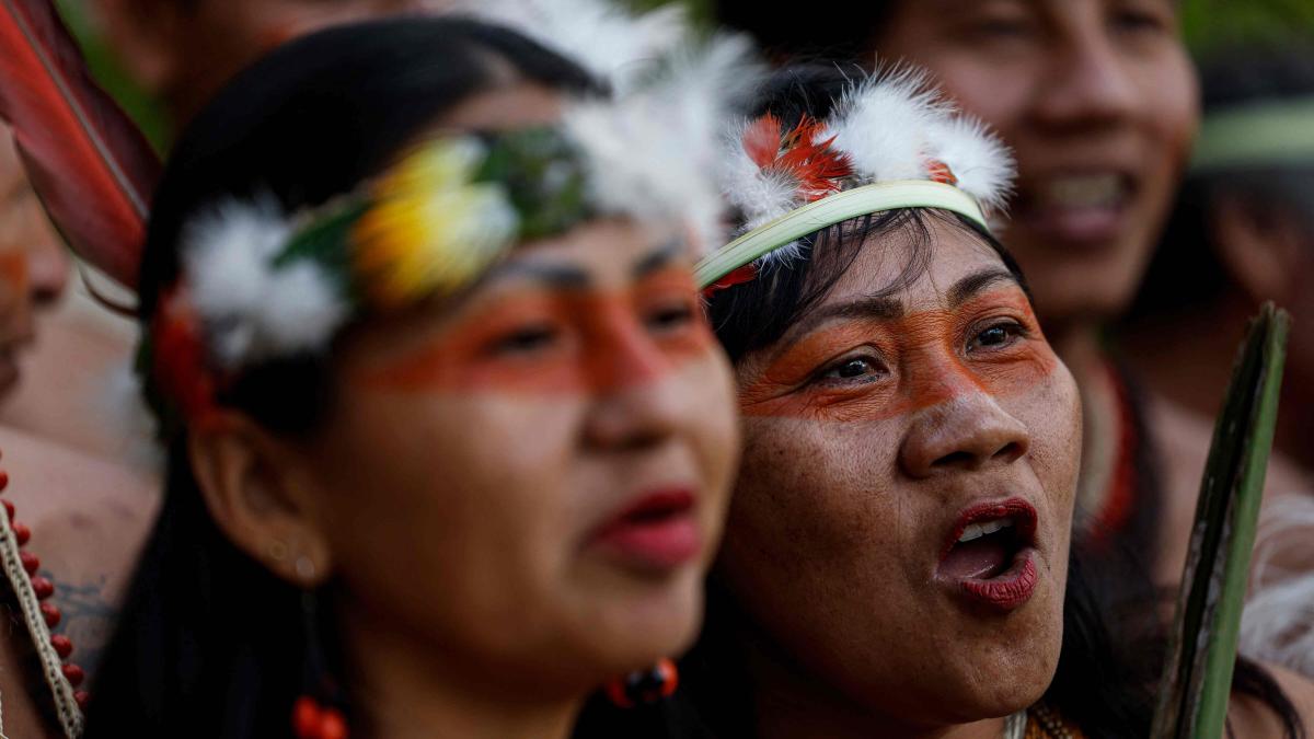 Members of the Waorani indigenous community demonstrate for peace, for nature, and to promote a Yes vote in the referendum to end oil drilling in the Yasuni National Park, in the commercial area in northern Quito, on August 14, 2023.