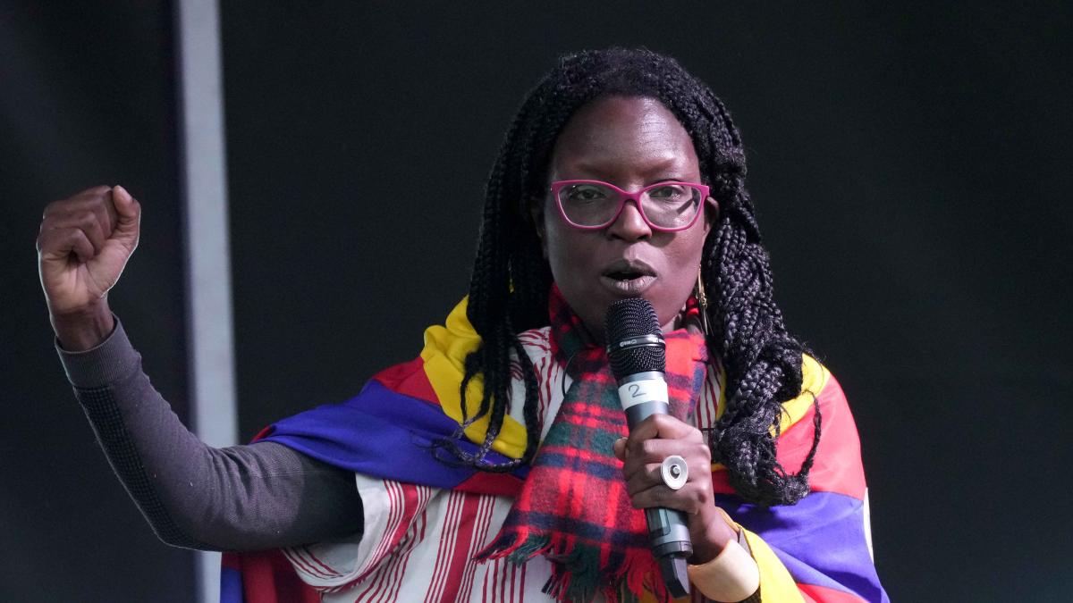 Climate activist Ina-Maria Shikongo speaks during the Fridays For Future march on November 5, 2021 in Glasgow, Scotland.